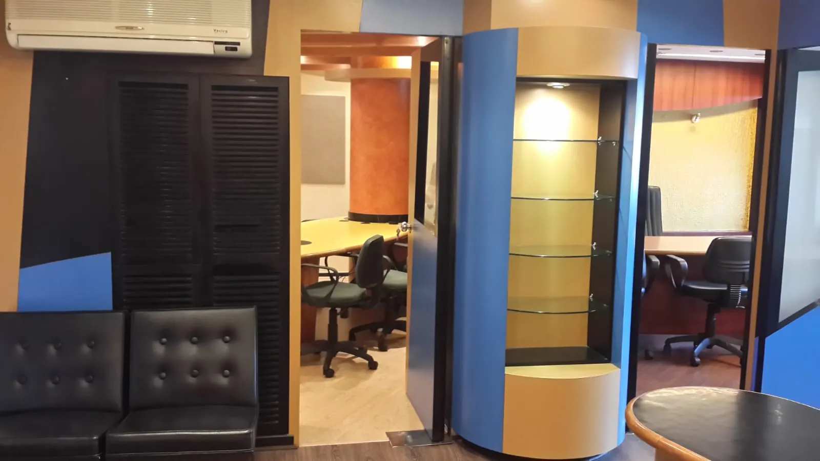 Reception waiting area and workspace in a furnished Chembur office
